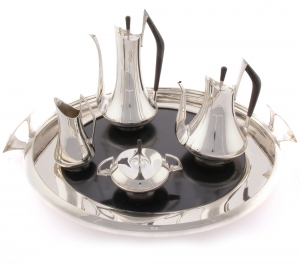 5. A ‘Circa 70’ silver and ebony four-piece tea and coffee service with tray, by American artist Donald Colflesh (b. 1932-), dates to circa 1962.